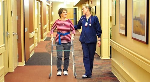 nurse assisting a patient